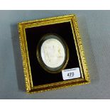 Faux ivory cameo style plaque in a giltwood frame, 16 x 13cm overall