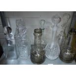 Collection of eight various decanters and stoppers, (8)