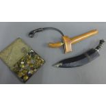 Kukri dagger, a Kris, a small curved dagger and a tin containing various military buttons etc., (a