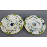 Pair of Cantigalli type floral pattern tin glazed plates, (2)