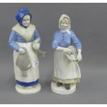 Two German blue and white glazed figures of Fishwives, tallest 25cm, (2)