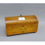 19th century mahogany and inlaid caddy, with domed hinged lid and turned finial with urn motif to