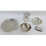 A collection of Eastern silver and white metal to include a match box cover, bowl, box and cover and