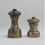 Tiffany & Co Sterling silver pepper grinder, 6cm together with a Birmingham silver pepper grinder (