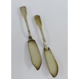 George IV silver fiddle pattern butter knife, London 1827 together with another (2)