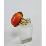 Coral set dress ring on a yellow metal band, UK ring size M