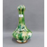 Chinese green glazed vase applied with Lizard decoration on a circular foot rim, 33cm high