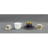 Royal Worcester blue glazed demi tasse cup and saucer with gilt highlights and jewelled borders