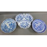 Blue and white pottery to include two Willow patterned bowls and a Meissen blue and white serving