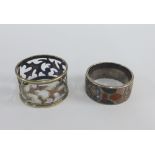 Early 20th century silver and Scottish hardstone napkin ring together with an Epns thistle pattern