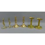 Brass candlesticks to include a pair of 19th century desk candlesticks a pair of Victorian Thistle