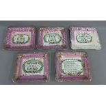 Group of five Sunderland lustre wall plaques with pink borders to include 'God is Love', 'Prepare to