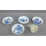 18th century pearl ware to include four various floral patterned saucers and a fluted cup with