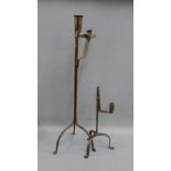 Two 18th century iron rush light holders, tallest 54cm high, (2)