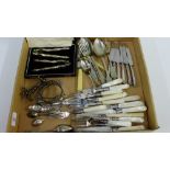 A mixed lot comprising mother of pearl and Epns flatware, a cased set of Epns nut cracks, knife