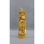 Carved fruit wood figure of a Deity, 33cm high