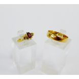 18 carat gold wedding band and a gold and amethyst dress ring (2)