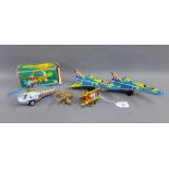 Group of 1980's and later tin plate Aeroplanes to include two Navy Jets, friction powered, made in