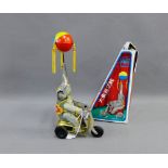 1970's Chinese tin plate elephant on bike, clockwork with integral key, boxed, 26cm high