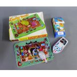 Japanese tin plate boat, boxed, together with a mechanical Lucky Mouse, boxed, tin plate toy, (2)