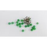 Paste set star brooch, 3.5cm wide an a collection of loose jade beads(a lot)