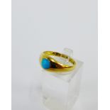 18 carat gold ring with a turquoise cabouchon, the inner band with a full set of Birmingham