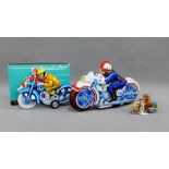 Three tin plate motorbike toys to include a Japanese PD Police Bike, a small German Bike and Sidecar