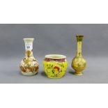 Collection of Japanese earthen wares to include two bottle neck vases and a small yellow glazed pot,