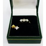 18 carat gold three stone diamond ring together with an 18 carat gold and diamond set pendant (2)