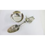 Small silver bowl with three hoof feet, stamped 830 together with a Dutch silver spoon, the bowl