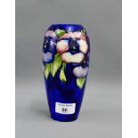 Moorcroft blue glazed baluster vase tube line decorated with Anemones, with facsimile, signature and