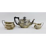 Edwardian silver Bachelor teaset comprising teapot, milk jug and sugar bowl, William Aitken,