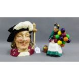 Royal Doulton 'Old Balloon Seller' HN1315, together with a Doulton Porthos Toby jug, D6440, (2)