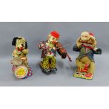 Collection of three 1950's plastic and tin plate battery operated Japanese automata to include a