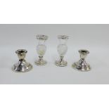 Pair of George V silver desk candlesticks, London 1927, 5.5cm high together with a pair of silver