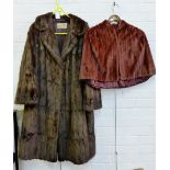 Ladies brown fur coat and red fur shoulder cape, (2)