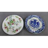 Delft blue and white plate, together with a Japanese fruit and foliage patterned plate, (2)