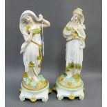 Pair of Continental porcelain female figures on a Rococo style bases, 32cm high (2)