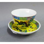 Chinese yellow glazed Dragon patterned teabowl and saucer, (2)