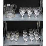 Quantity of facet cut drinking glasses and a water jug (a lot)