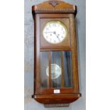 Oak cased wall clock