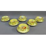 Paragon hand painted fruit patterned set of six cups and saucers, signed J. Martin, with printed