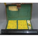 Mahjong set in a leather case with lacquered tile trays, (5)
