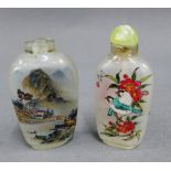 Chinese reverse painted glass snuff bottle, together with another with a jadeite stopper, (2)