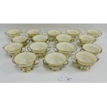 Sixteen Lenox porcelain consomme cups with Sterling silver stands (16)