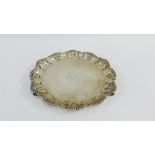 Edwardian silver salver with shell border and on three hoof feet, makers mark for Richard Martin and