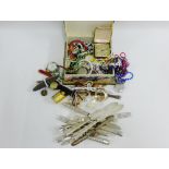 A mixed lot of costume jewellery to include beads, brooches, etc and miscellaneous Epns flatware (