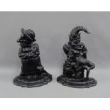 Pair of cast iron Punch and Judy doorstops, 22cm high, (2)