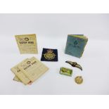 Mixed lot to include a Ration Book, a Royal Navy brooch, a white metal Anchor, RAC cap badge, RAF