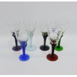 Set of six floral etched glasses on coloured stems and foot rims, (6)